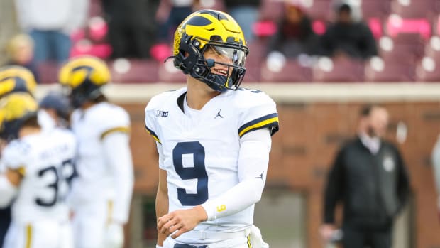 Oct 7, 2023; Minneapolis, Minnesota, USA; Michigan Wolverines quarterback J.J. McCarthy (9) warms up before the game against the Minnesota Golden Gophers at Huntington Bank Stadium. Mandatory Credit: Matt Krohn-USA TODAY Sports